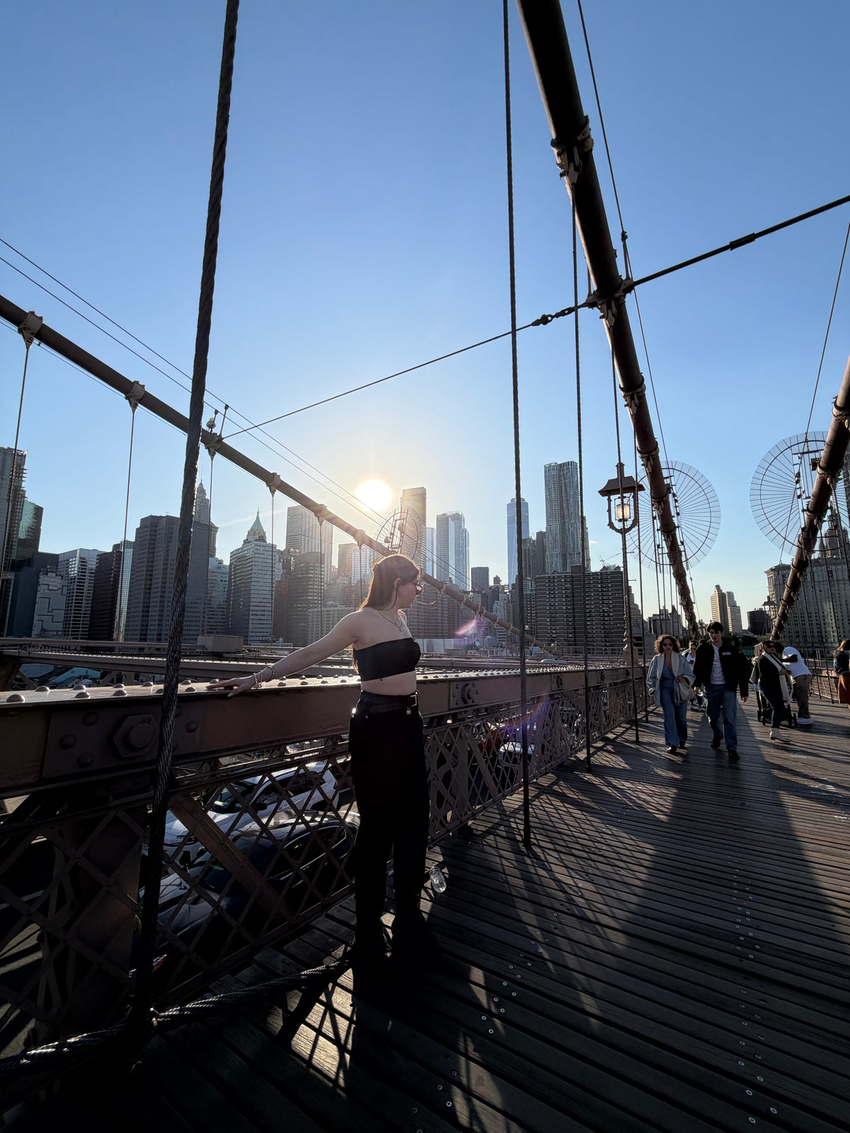 Molly in black trousers on Brooklyn Bridge