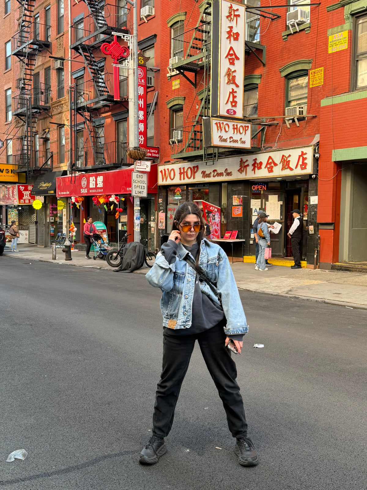 Molly in a layered city uniform in Chinatown